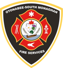 The OSM Fire Department Crest - maltese cross, with the OSM Township logo in the centre.